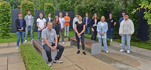 Traditional group picture of the new trainees in front of the MC-Bauchemie training centre in Bottrop. 